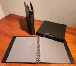 Lindner ALN-1124 black 18 ring deep grained vinyl binders with slip cases; used but in good condition [$67.15 at Subway], winning bidder can buy up to 10 at the bid price