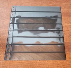 8 pocket black two sided pages for the Lindner 18 ring binders; used but in good condition; winning bidder can buy up to 13 at the high bid; very hard to photograph!!