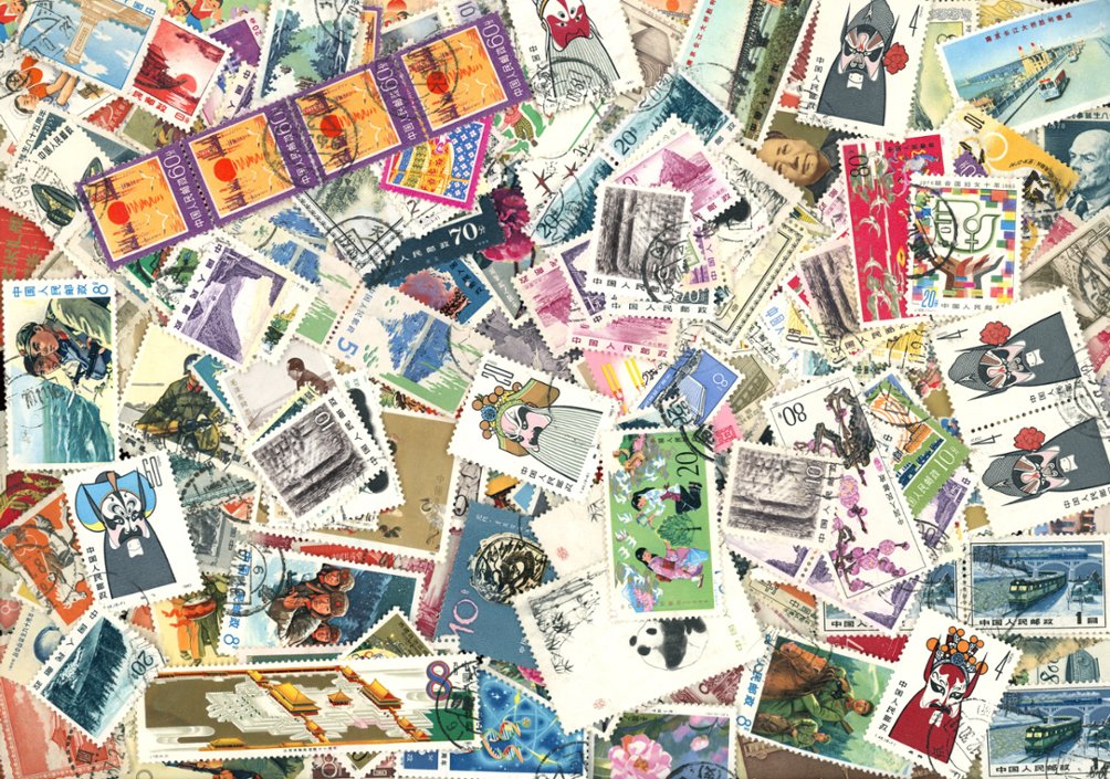 100+ (but not counted) envelope of used and unused stamps