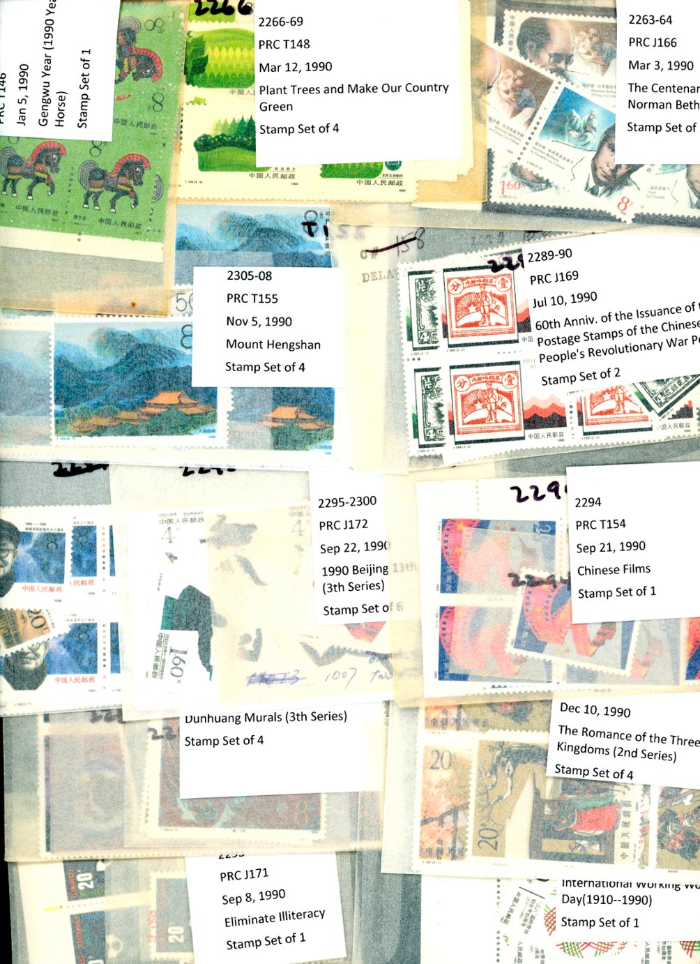 A dealers stock of 1990 in multiples of four or more in well labeled glassines. See the second image for a detailed list of what is included. (2 images)