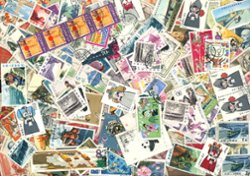 100+ (but not counted) envelope of used and unused stamps