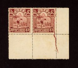 214 variety, CSS 252 variety, 1913 Junk London Printing 20c. brown-lake horizontal pair from the lower right corner of the pane with full selvedge, showing major plate crack at right, fine unused with original gum. A spectacular plate variety. (ex Jan & Dan Olsson)