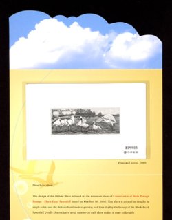 Specimen 1 December 2009 with folder (2 images)