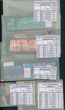 200+ identified postally used stamps sorted and in glassines