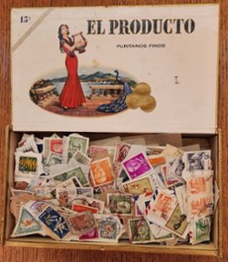 An old time cigar box filled with about 1,000 Foreign and U.S. stamps (will be shipped without the box to save postage)