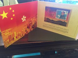 2775 PRC 1997-10 Gold Embossed Return of Hong Kong Souvenir Sheet in presentation folder (4 images)