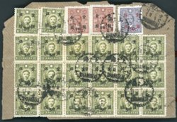 1948 Dec. 1 portion of parcel wrapper sent from Shanghai franked with Sc. 857, 861 (2), 867 (20), showing one of the primary early uses of the $5 Sc.867 and the $10 Sc. 872, issued on Nov. 22 and 24, respectively, which were then the highest denomination stamps available in China (3 times and 6 times the highest denomination China National Currency stamp, the $5,000,000 Sc. 799).